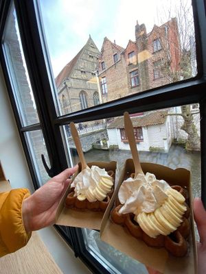 One of them is with chocolate the other is with caramel  at Otto Waffle Atelier in Bruges