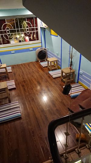 Up the stairs is a cosy little place to sit & enjoy. 
Easy listening reggie music was playing throughout the place. It was really calming & easy to sit & chat. at The Railway Hanoi 2 in Hanoi