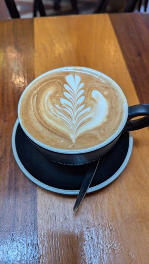 Flat white with oat milk at Metropole QVB in Sydney