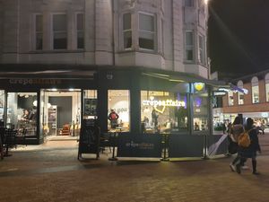 Storefront with outdoor seating. at Crêpeaffaire in Bromley