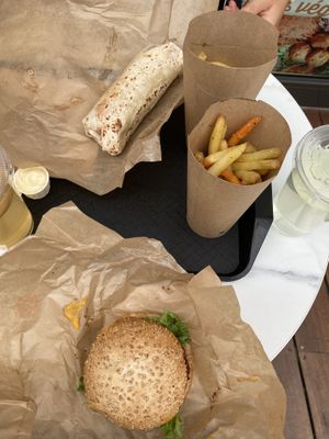 Burger, falafel wrap and fries  at Copper Branch - Cours Charlemagne in Lyon