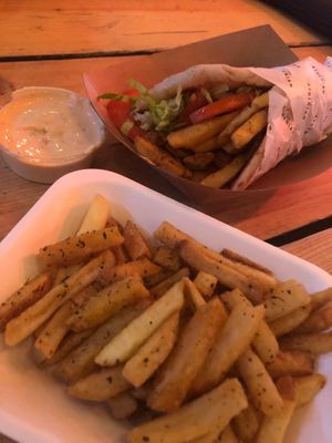 Seitan wrap and origami fries with dipping sauce at The Athenian in East London