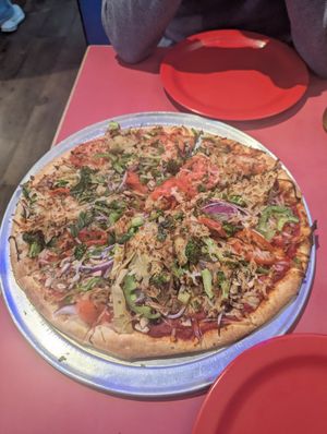 This was a pizza fit for champions. Flavourful of course, but also incredibly dense with toppings as can be clearly seen. Not just decorated with toppings as is sometimes the case. at Extreme Pizza - Union St in San Francisco