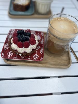 Vegan tart and vegan latte  at Nuts in Biarritz