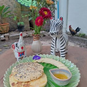 Fresh baked pita with village free run chicken eggs any style. (french toast) at Little Eden in Dawei in Dawei