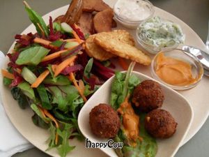 Vegan Tasting Plate at Cafe N. Seitan, potato wedges, 3 dipping sauces, salad, sweet potato at Cafe N in Copenhagen