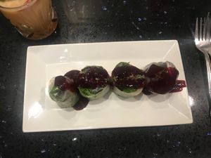 Basil rolls w raspberry sauce at Poor Calvin's in Atlanta