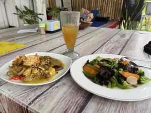  Singarajan dish, kombucha, and 5 veggie plate  at Vegi House in Singaraja