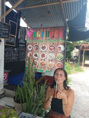 Menu options and outside seating at Vegi House in Singaraja