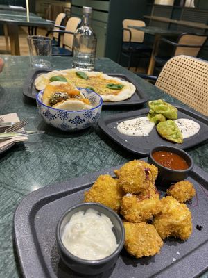 Gyosa , Pizza, cauliflower and another starter  at The Green Affair - Chiado in Lisbon