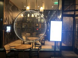 Logo in metal  at The Green Affair - Chiado in Lisbon