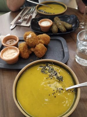 Entrees: Seasonal vegetable soup, spinach croquettes and cauliflower "wings". at The Green Affair - Chiado in Lisbon