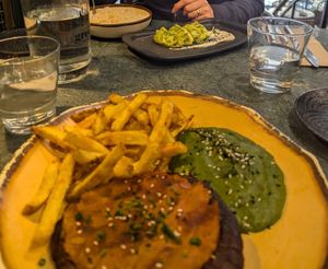 Seitan steak with pesto rosso, spinach purè and friend potato at The Green Affair - Chiado in Lisbon