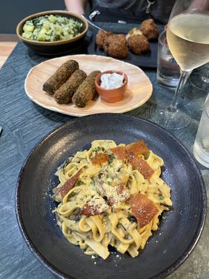 Cauliflower wings, croquettes, and carbonara.   at The Green Affair - Chiado in Lisbon