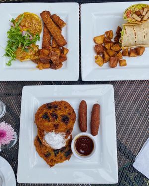 benedict, buffalo wrap & pancakes 💚 at Darbster in West Palm Beach