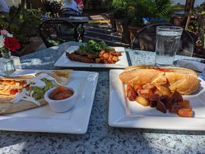Quesadillas (left), cheesesteak (right) and Benedict (middle) at Darbster in West Palm Beach