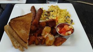 Tofu Scramble pepper, onion, mushroom, daiya cheeze, tofu eggs , home fries, gimme lean sausage, toast at Darbster in West Palm Beach