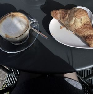 Custard croissant and soy cappuccino at Sophie Bistrot and Bakery in Padua