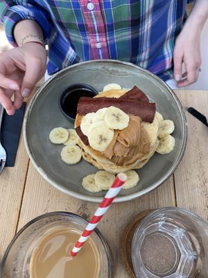 Pancake stack with peanut butter, banana, bacon and maple syrup  at Potts Coffee in Liverpool