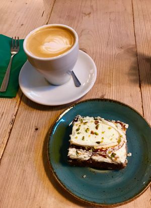 flat white and carrot cake at Potts Coffee in Liverpool