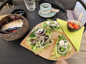 Açaí bowl and avocado on toast + coffee at Roots in Zagreb