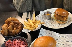 Clucky Burger, onion rings, coleslaw  at Byron in Edinburgh