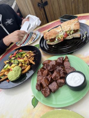 Frachos, the original coal sandwich, and the Thai chili seitan bites   at Crust and Crumble in Asbury Park