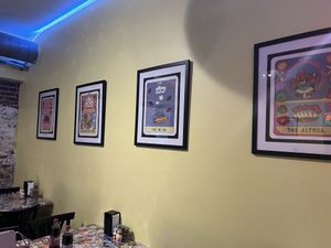 Tables full of cool stickers   at Crust and Crumble in Asbury Park