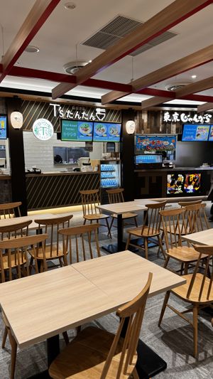 Located in the middle of food court   at NRT - T's Tantan - T1 in Narita