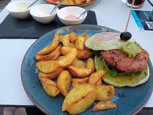 Vegan burger with sauces at Taste in Chaves