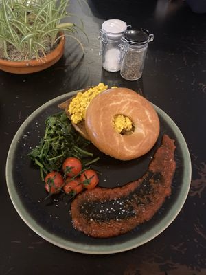 Tofu scramble and seitan bacon bagel  at Lilith's  in Cheltenham