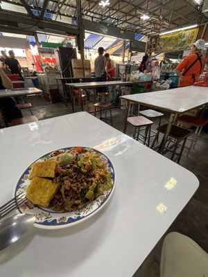 Stall is inside the local market   at Chalawan - Vegan Food Stall in Bangkok
