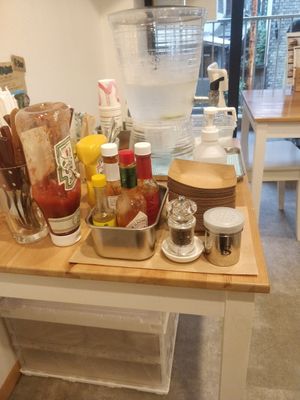 Sauce and water station at Great Lakes in Tokyo