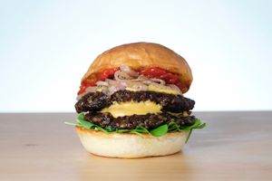 100% vegan and homemade Superior Burger. Vegan patty, vegan cheese sauce, tomato jam, marinated onions, baby greens, and vegan mayo.  at Great Lakes in Tokyo