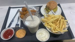 Chili cheese burger, vanilla shake, chicken nuggets  at Dirty Vegan in West London