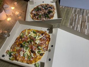 Super delicious vegan pizza with plenty of veggies for take away ! at Horizon Cafe in Koh Samui