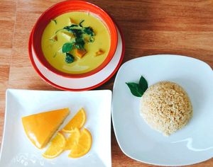 Organic steamed rice with pumpkin curry and cake at Horizon Cafe in Koh Samui