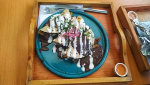 Enfrijolada proteína de orellana 10/10 💚 at Dalia Plant Power Mex in Bogota