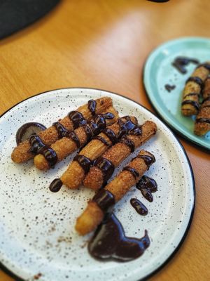 Churros 🌱💕 at Dalia Plant Power Mex in Bogota