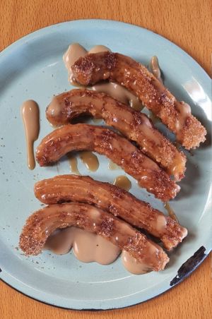 Churros con arequipe at Dalia Plant Power Mex in Bogota