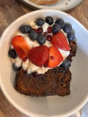 Banana choc chip loaf toasted with coconut yoghurt with maple syrup and berries - unreal!   at Mr Cooper's Coffee House in Whitby