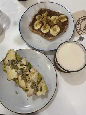 Avocado toast with tofu and gluten free and sourdough bread. Cacao and banana with sourdough bread. Delicious!  at Perspectives in Granada