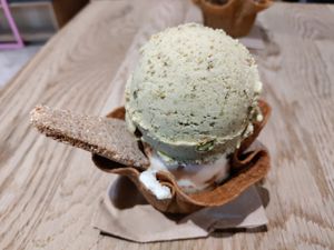Pistachio and lemon pie with edible spoon and cup at Nieve de Olla in Mexico City