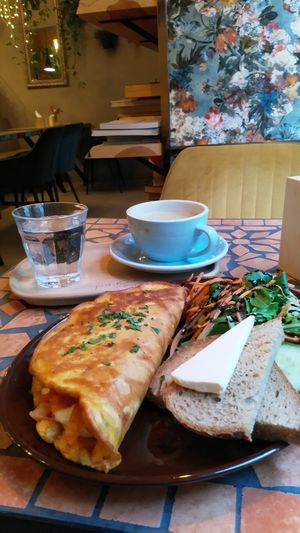 Chickpea omelette with bread, salad and Coffee at Palo Verde in Prague