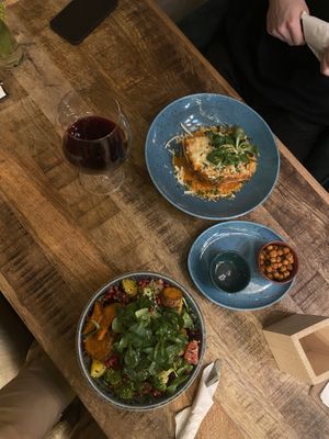 Vegan Buddha bowl with beluga beans and quinoa, vegan lasagna  at Palo Verde in Prague