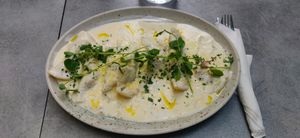 Ravioli with oyster mushrooms, cream sauce and truffle oil at Palo Verde in Prague
