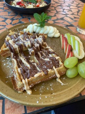 freshly made waffles with chocolate sauce  at Palo Verde in Prague
