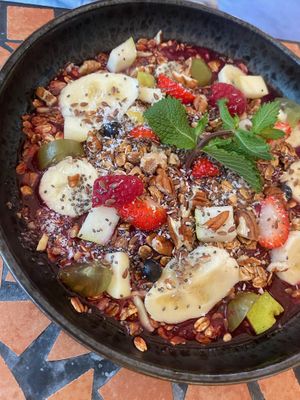 smoothie bowl with homemade granola and fresh fruit  at Palo Verde in Prague