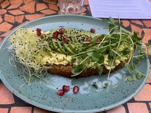 The bread is wonderful enriched with sumptuous spread topped with a generous amount of avocado. The greens and the pomegranate add harmony and a tempting appearance to the creation. Maybe the mustard is a bit overdosed.  at Palo Verde in Prague