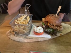 Korean burger with kimchi and fries  at Palo Verde in Prague